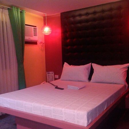 Icon Hotel Manila Habitación foto