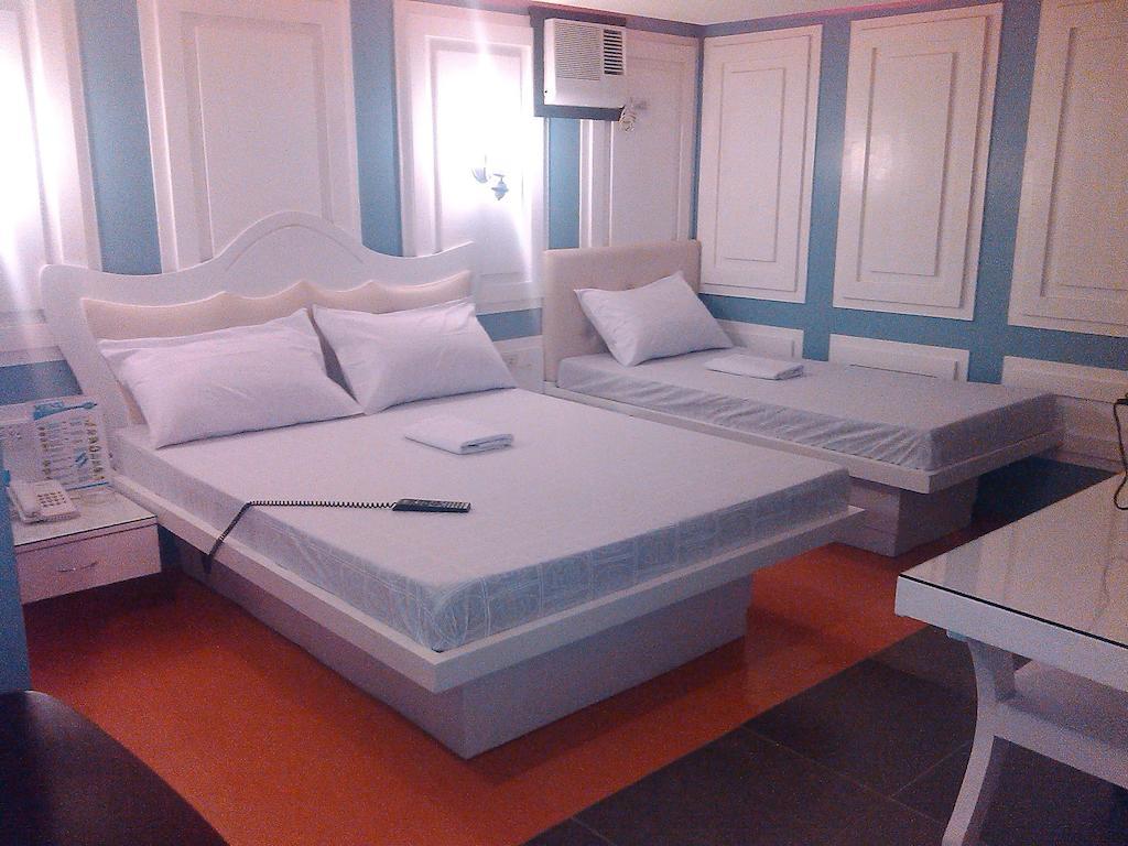 Icon Hotel Manila Habitación foto