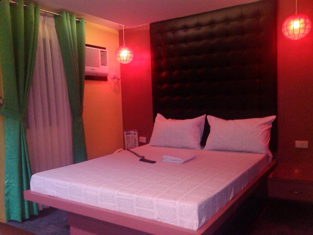 Icon Hotel Manila Habitación foto