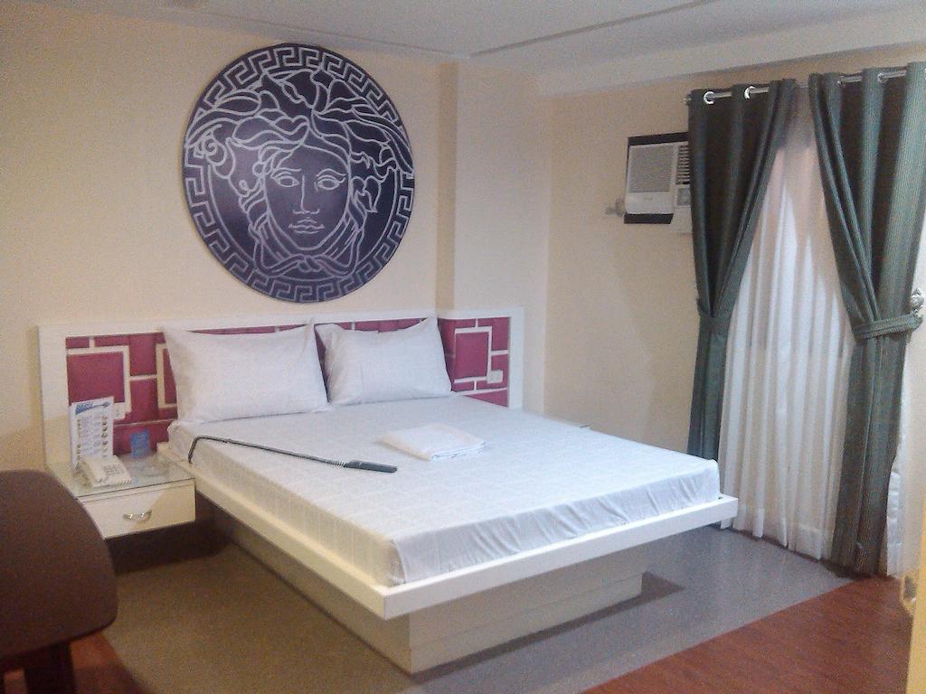 Icon Hotel Manila Habitación foto
